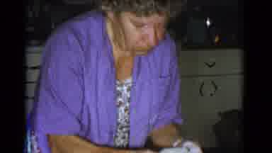COTTONWOOD ARIZONA-1968: Old Woman Kneading Dough in Purple Shirt