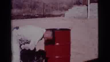 Cottonwood Arizona (1968): Man Washing Dogs