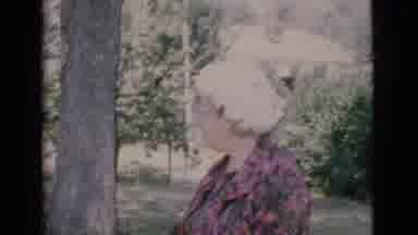 Cottonwood Arizona (1968): Grandmotherly Figure Standing In Yard Talking And