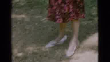 Cottonwood Arizona (1968): Woman In Rose Colored Dress Smoking Cigarette