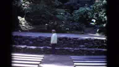 San Diego County California (1968): Woman Stares Into Bushes