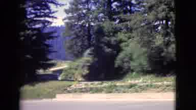 San Diego County California (1968): Two People Walk Towards Tan Building On A