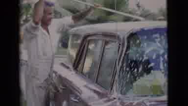 San Diego County California (1968): Footage Shows Man In White Overalls Washing A