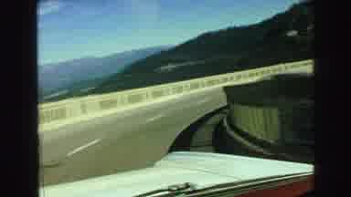 Vancouver Bc Canada (1968): Footage Of A Car Driving Over A Bridge And A Group Of