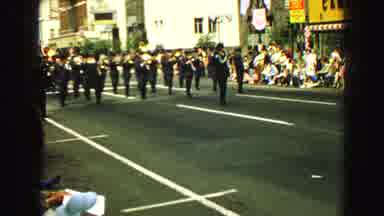 Vancouver Bc Canada (1968): A Marching Band And A Float Proceed In A Colorful