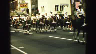 Vancouver Bc Canada (1968): Clowns Push Red Objects Ahead Of Mounted Patrol Team