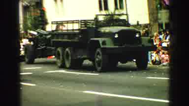 Vancouver Bc Canada (1968): Military Trucks Roll Slowly Down The Road, Presumably