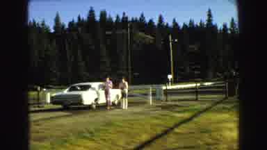 Vancouver Bc Canada (1968): Man And Woman Standing Next To Car Parked On Road In