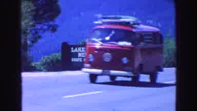 Vancouver Bc Canada (1968): Vw Van Driving Down The Highway Near Lake Tahoe