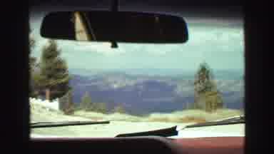 Vancouver Bc Canada (1968): Passing View Of Mountains,Trees And Blue Sky On A