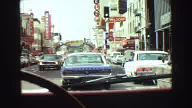 Vancouver Bc Canada (1968): Driving In A Busy City And Then Pans To A Scenic Park