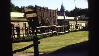 Vancouver Bc Canada (1968): Old Hay Cart Amongst Buildings Near A River