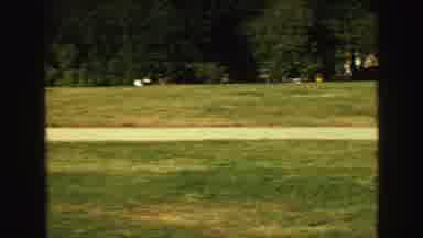 Vancouver Bc Canada (1968): Footage Of A Garden View With Trees And A Large Wall