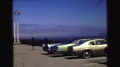 Vancouver Bc Canada (1968): View Of Cars Parked In A Parking Lot Near The Ocean