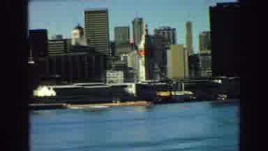 Vancouver Bc Canada (1968): A City Street With Lots Of Tall Buildings In The