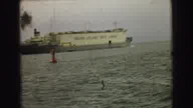 Vancouver Bc Canada (1968): View Of Tan Ocean Liner With Black Speed Boat In Open