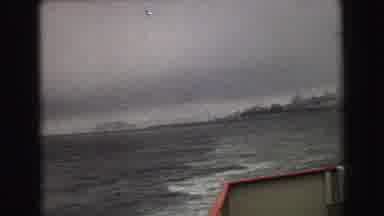Vancouver Bc Canada (1968): Camera Zooms In On Distant Bridge And Steep Shoreline