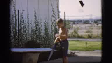 Cottonwood Arizona-1968: Father and Son Sawing Wood Together in Backyard