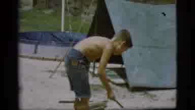 Cottonwood Arizona (1968): Boy Makes Campfire In Leisure Camp Amid Nature On