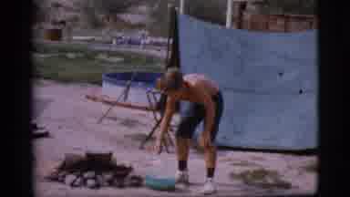 Cottonwood Arizona (1968): A Man Preparing Food At Camp At The Campfire