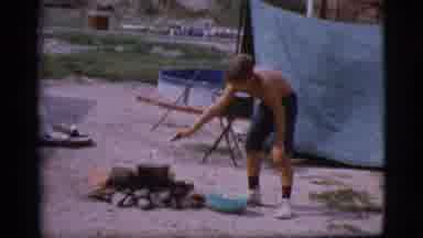 Cottonwood Arizona (1968): Young Boy On Camping Trip Scoops Into Pot Over Fire