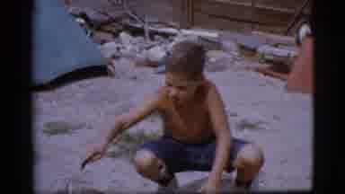 Cottonwood Arizona (1968): Kid Stoking A Fire With A Coffee Pot And Another Pot