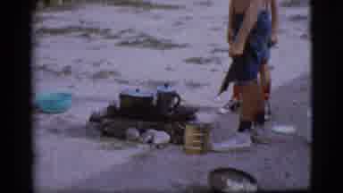 Cottonwood Arizona (1968): Two Teenage Boys Pouring Water Into A Coffee Pot Over