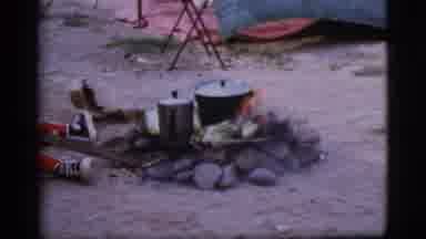Cottonwood Arizona (1968): Little Boy Without His Shirt On Stoking A Fire With A