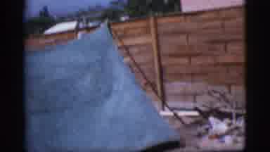 Cottonwood Arizona (1968): A Blue Tent And A Boy Holding A Wand And Stirring A Pot