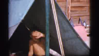 Cottonwood Arizona (1968): Child Waving In A Tent