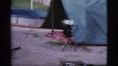 Cottonwood Arizona (1968): Two Children And A Man In A Tent Eating During The Day