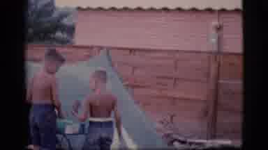 Cottonwood Arizona (1968): Footage Of Two Little Boys Washing The Dishes Outside