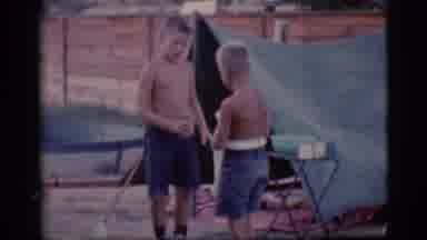 Cottonwood Arizona (1968): Two Young Boys Together With A Tent Stuck Under The