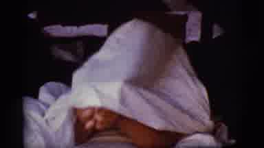 Cottonwood Arizona (1968): A Man Laying In Bed Readjusts The Sheet That Is