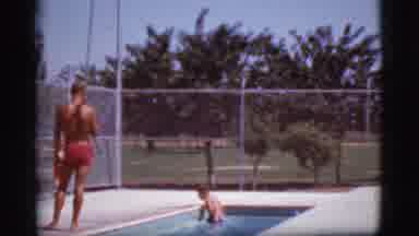 Cottonwood Arizona (1968): A Kid Is Swimming In Pool And A Man Is Looking At Him