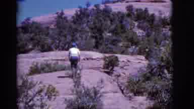 Arizona USA (1968): Mom Waves As She Nears The Top Of The Trail And Signals