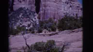 Arizona USA (1968): A Man In The Woods Walking On Boulders Then Walking Into The