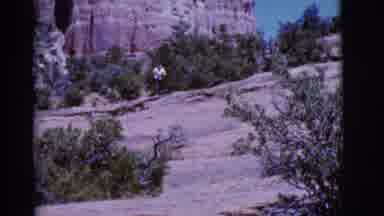 Arizona USA (1968): Person Runs Up And Down The Large Rocks And Does A Pose At The