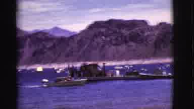 Arizona USA (1968): The Ocean And Cliffs Are Idyllic Looking As The Boat Comes