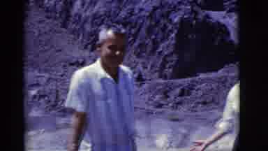 Arizona USA (1968): Vintage Smiling Older Couple On Sunny Beach Camera Pans Across