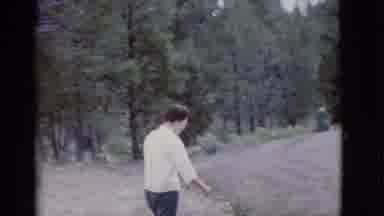Arizona USA (1968): A Man Overlooking A Rocky Canyon And Mountain-Like Area