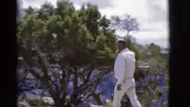 Arizona USA (1968): A An Looking At The Mountain Ranges While Smoking A Cigarette