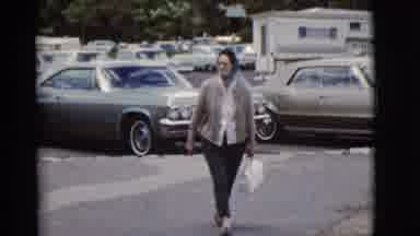 Arizona USA (1968): Lady Walking Wearing A Headscarf And Holding A Handbag