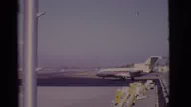 Arizona USA (1968): View Of Red And White Jet Preparing For Takeoff On A Clear Day