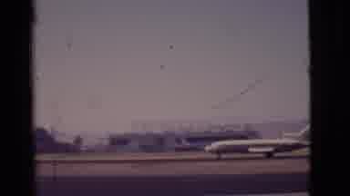 Arizona USA (1968): Jumbo Jet Taxiing Down Runway Past Camera And Takes Off At