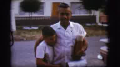 Flagstaff Arizona (1968): Father With Children Hugging In The Middle Of An Old