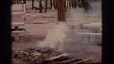 Flagstaff Arizona (1968): There Is A Man Lighting Something Up Causing The Smoke