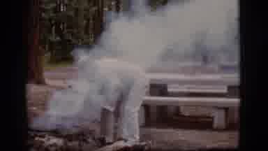 Flagstaff Arizona (1968): Man Trying To Tame A Campfire To Keep It Smoldering