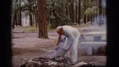 Flagstaff Arizona (1968): Man Sitting In His Lounge Chair Watching Friend Try To