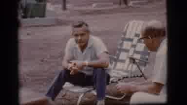 Flagstaff Arizona-1968: Two Men Talking And Laughing While Making Eye Contact